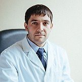 Врач Басок Станислав Михайлович	
