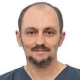 Врач Денисенко Юрий Юрьевич