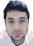 Врач Фаур Мохамад