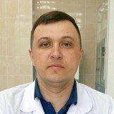 Врач Гринь Евгений Александрович