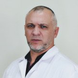 Врач Калатурский Максим Николаевич