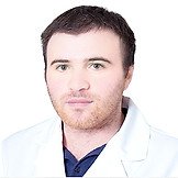 Врач Каркаев Максим Ризванович