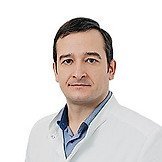 Врач Кошкарёв Максим Александрович