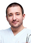 Врач Лучер Антон Евгеньевич