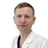 Врач Романюкин Виктор Николаевич